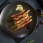 Involtini di asparagi e pancetta: sfiziosi e irresistibili