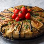Timballo di pasta e melanzane: una ricetta siciliana irresistibile